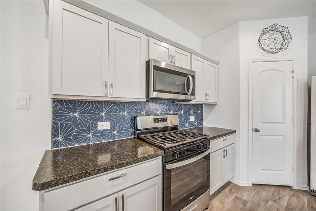 24322 Elmwood Falls Drive, Spring, TX 77373