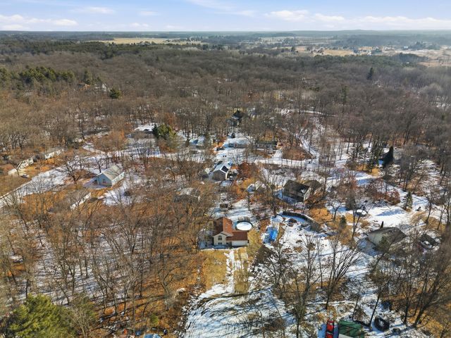 17091 Winona Court, Howard City, MI 49329