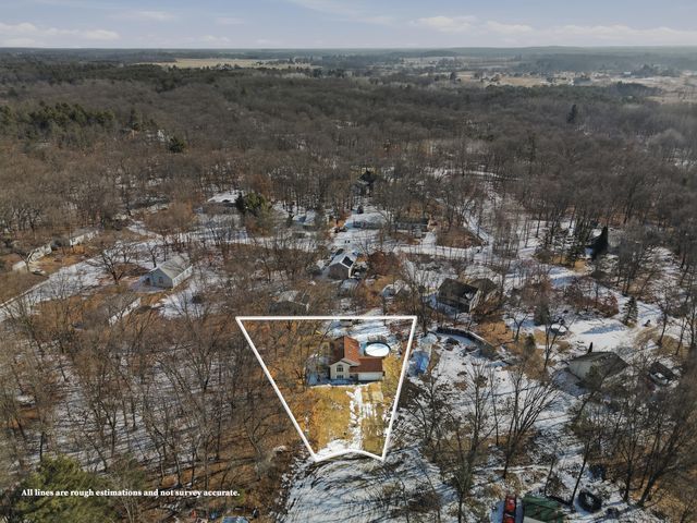 17091 Winona Court, Howard City, MI 49329