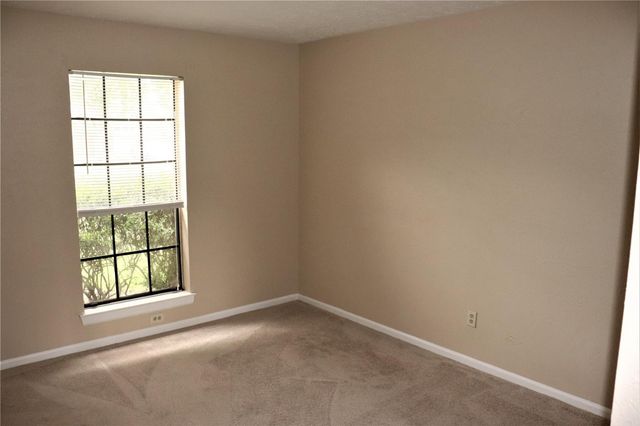 7718 High Village Drive 220, Houston, TX 77095