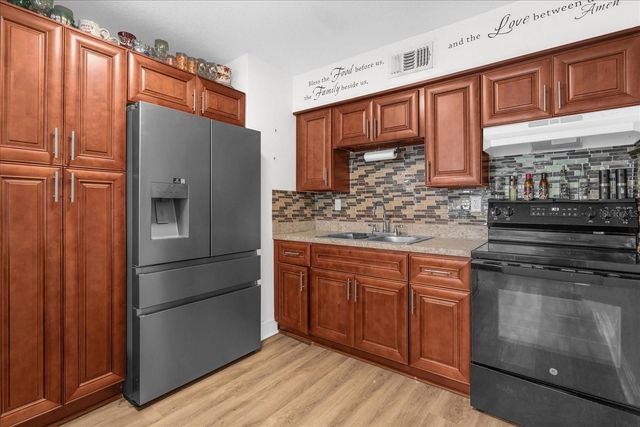 7304 POMELO DRIVE, Orlando, FL 32819