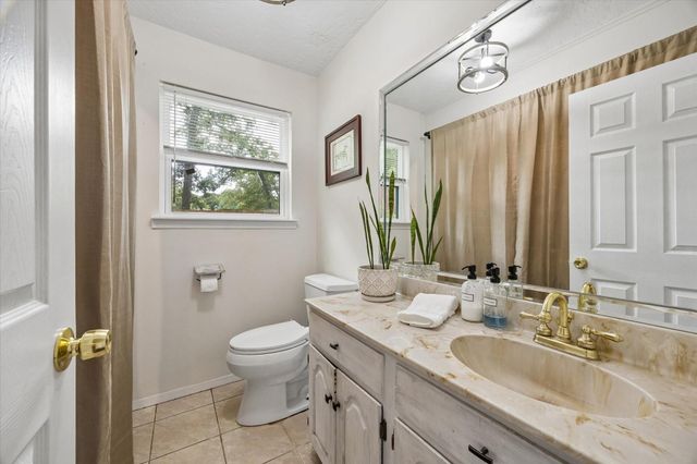 10765 Champion Forest Road, Conroe, TX 77303