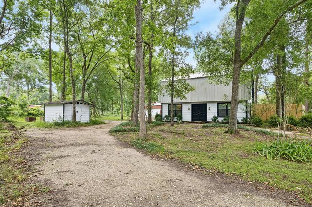 10765 Champion Forest Road, Conroe, TX 77303