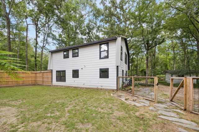10765 Champion Forest Road, Conroe, TX 77303