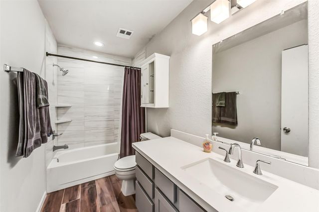 9114 Woodhouse Drive, Spring, TX 77379