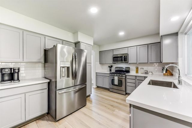 9114 Woodhouse Drive, Spring, TX 77379