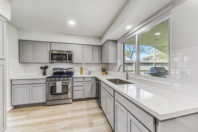 9114 Woodhouse Drive, Spring, TX 77379