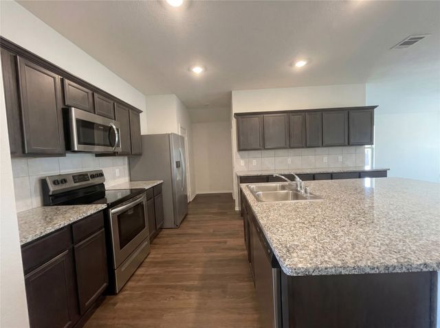 1310 Meadow Creek Drive, Princeton, TX 75407