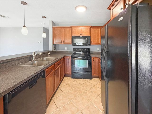 7706 E COMANCHE AVENUE, Tampa, FL 33610
