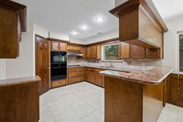 3406 Wildwood Ridge Court, Houston, TX 77339