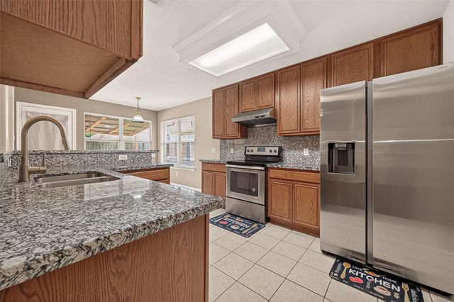11107 Creekline Meadow Court, Cypress, TX 77429