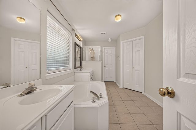 11107 Creekline Meadow Court, Cypress, TX 77429