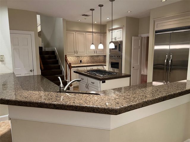 49 Rolling Links Court, Spring, TX 77380