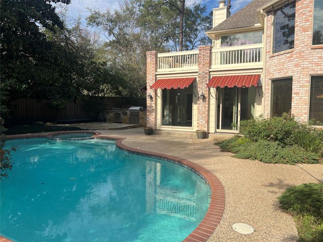 49 Rolling Links Court, Spring, TX 77380