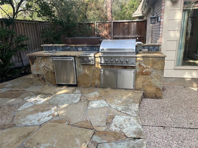 49 Rolling Links Court, Spring, TX 77380