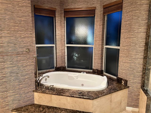 49 Rolling Links Court, Spring, TX 77380