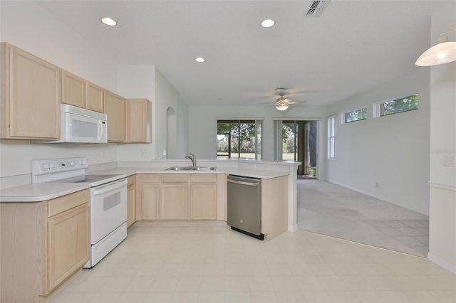 2023 ACADIA GREENS DRIVE 32, Sun City Center, FL 33573
