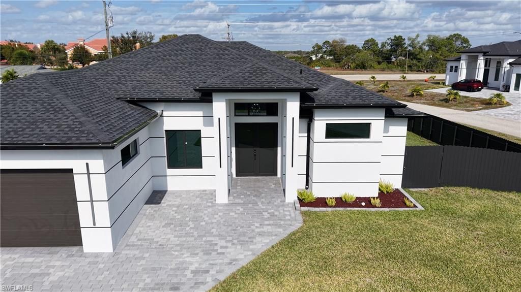 Image 2 of property listing at 1833 NE 23rd TER, Cape Coral, FL 33909