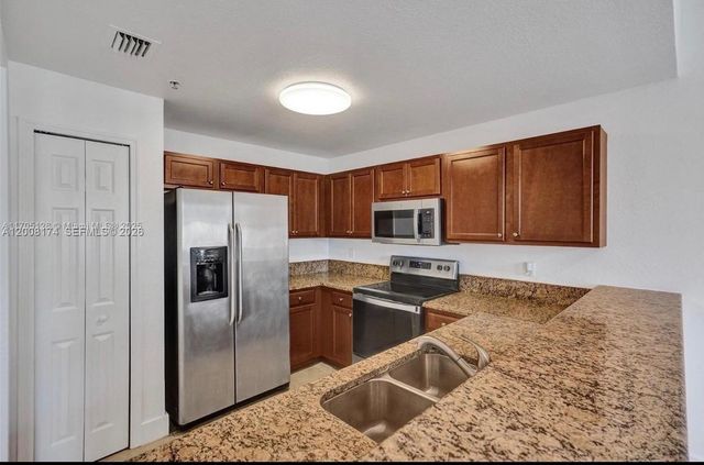 11401 NW 89th St 213, Doral, FL 33178