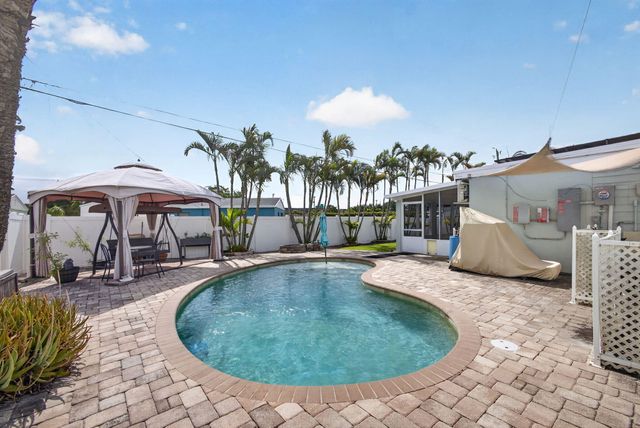 9342 Bloomfield Drive, Palm Beach Gardens, FL 33410