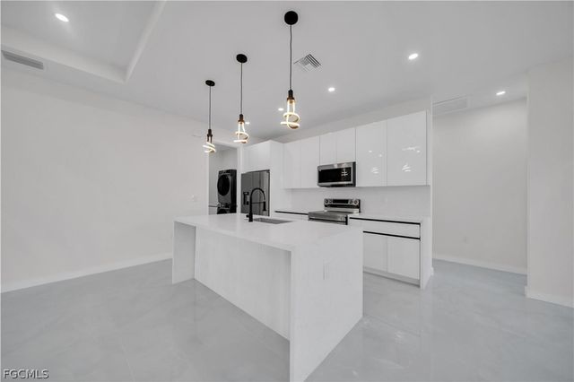 1930 Zombar CT, Lehigh Acres, FL 33972