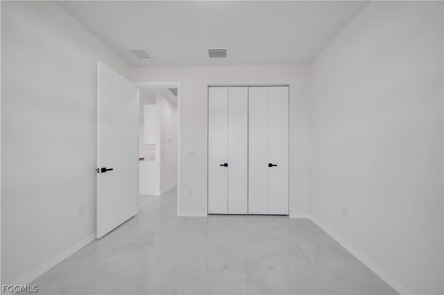 1930 Zombar CT, Lehigh Acres, FL 33972