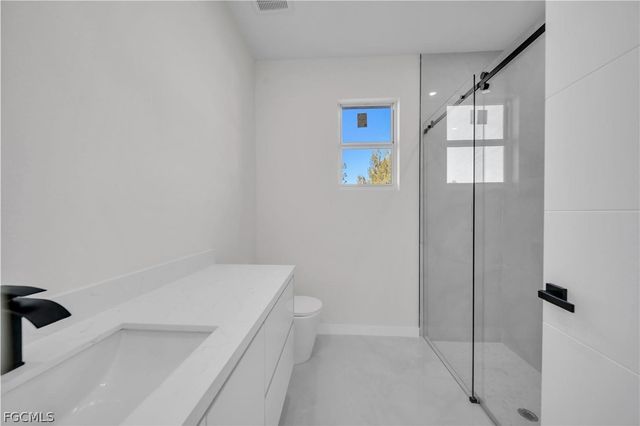 1930 Zombar CT, Lehigh Acres, FL 33972