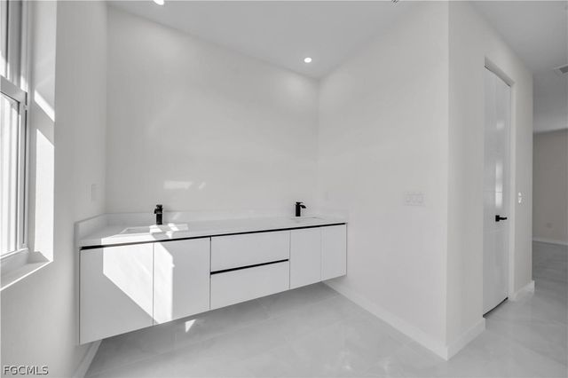 1930 Zombar CT, Lehigh Acres, FL 33972