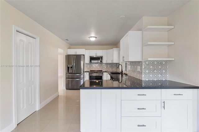 3880 Coral Hills Dr, Coral Springs, FL 33065