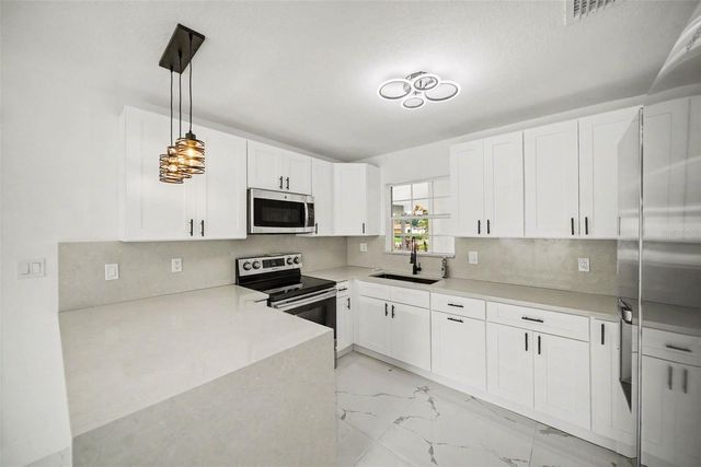 7813 N MATANZAS AVENUE, Tampa, FL 33614