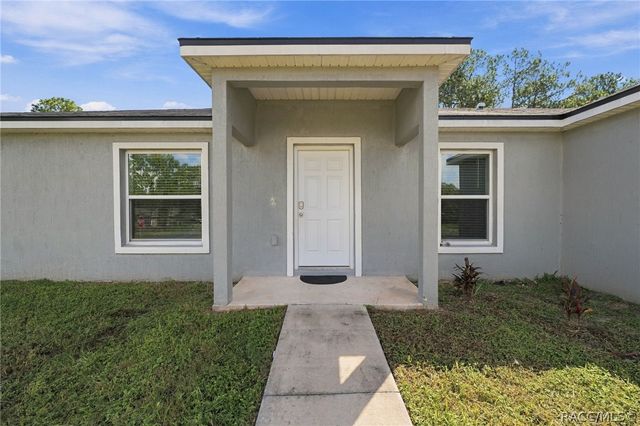 7839 N Quibble Avenue, Citrus Springs, FL 34434