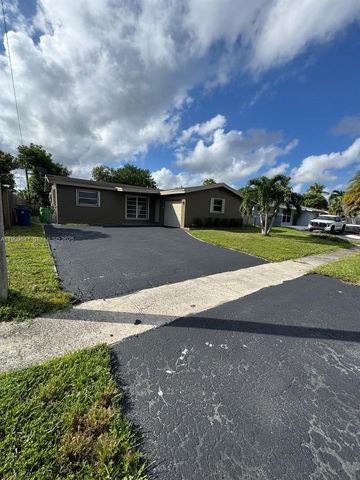 8670 NW 28th Pl ., Sunrise, FL 33322