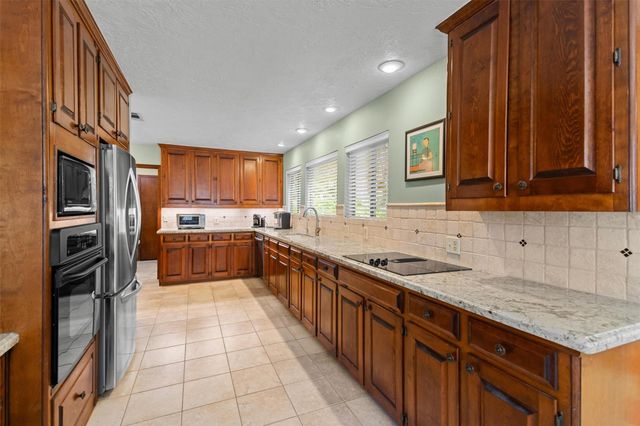 15749 Lakeway Drive, Willis, TX 77318