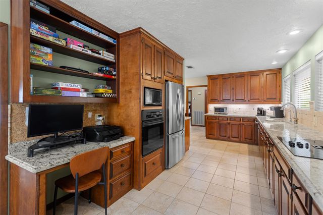 15749 Lakeway Drive, Willis, TX 77318