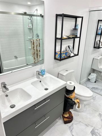 111 Alamanda Lane, Deerfield Beach, FL 33442