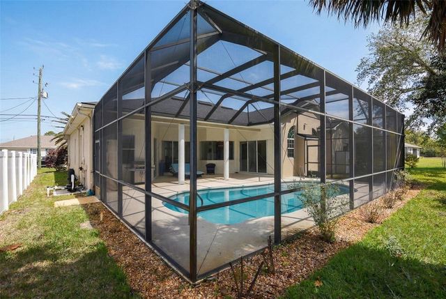 9 LONDON DR, Palm Coast, FL 32137