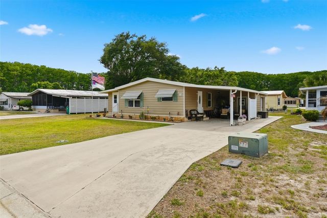 111 WINTERBERRY AVENUE, Wildwood, FL 34785