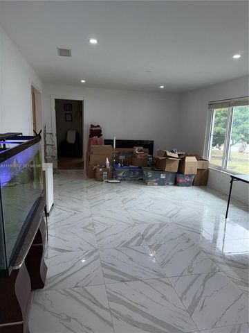 126 Sunflower Cir, Royal Palm Beach, FL 33411