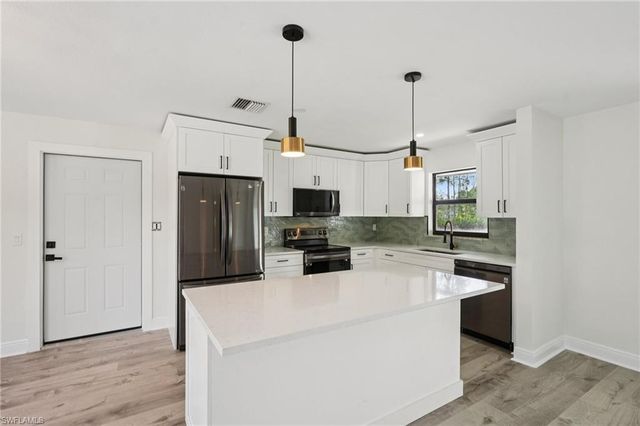 1503 14th ST, Lehigh Acres, FL 33972