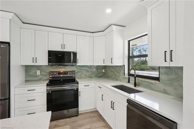 1503 14th ST, Lehigh Acres, FL 33972