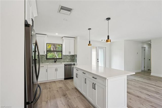 1503 14th ST, Lehigh Acres, FL 33972