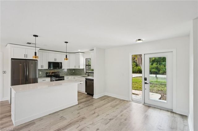 1503 14th ST, Lehigh Acres, FL 33972