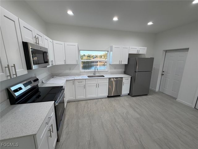 1409 NE 23rd ST, Cape Coral, FL 33909