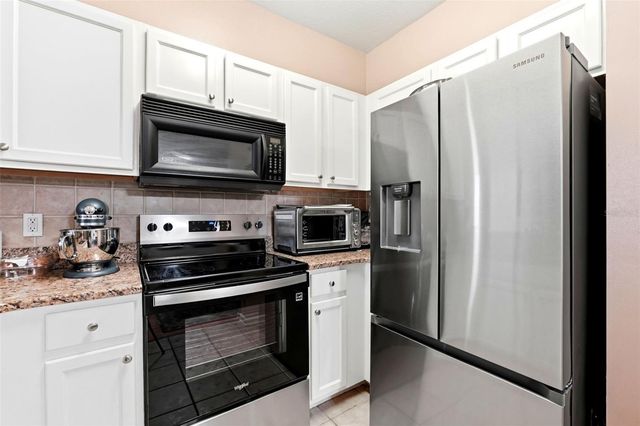 12837 MADISON POINTE CIRCLE 208, Orlando, FL 32821