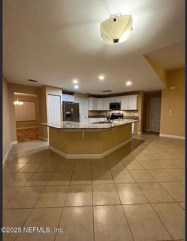 231 WELLINGTON Drive, Palm Coast, FL 32164