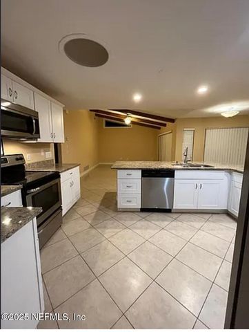 231 WELLINGTON Drive, Palm Coast, FL 32164