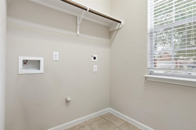 8911 Headstall Dr, Tomball, TX 77375