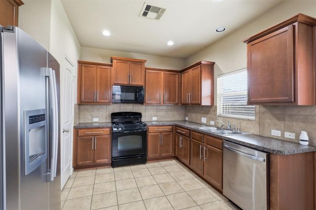 8911 Headstall Dr, Tomball, TX 77375