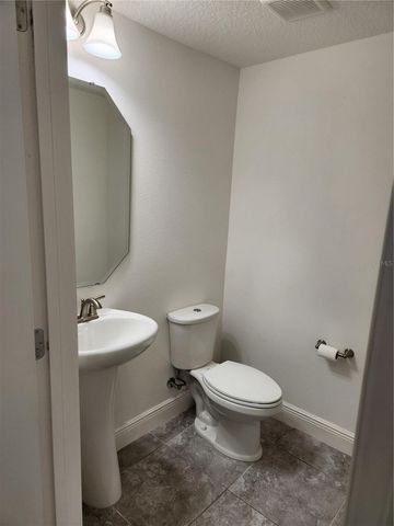9817 WINNINGTON STREET, Orlando, FL 32832