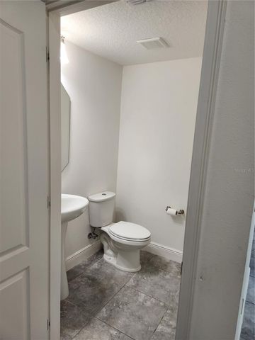 9817 WINNINGTON STREET, Orlando, FL 32832